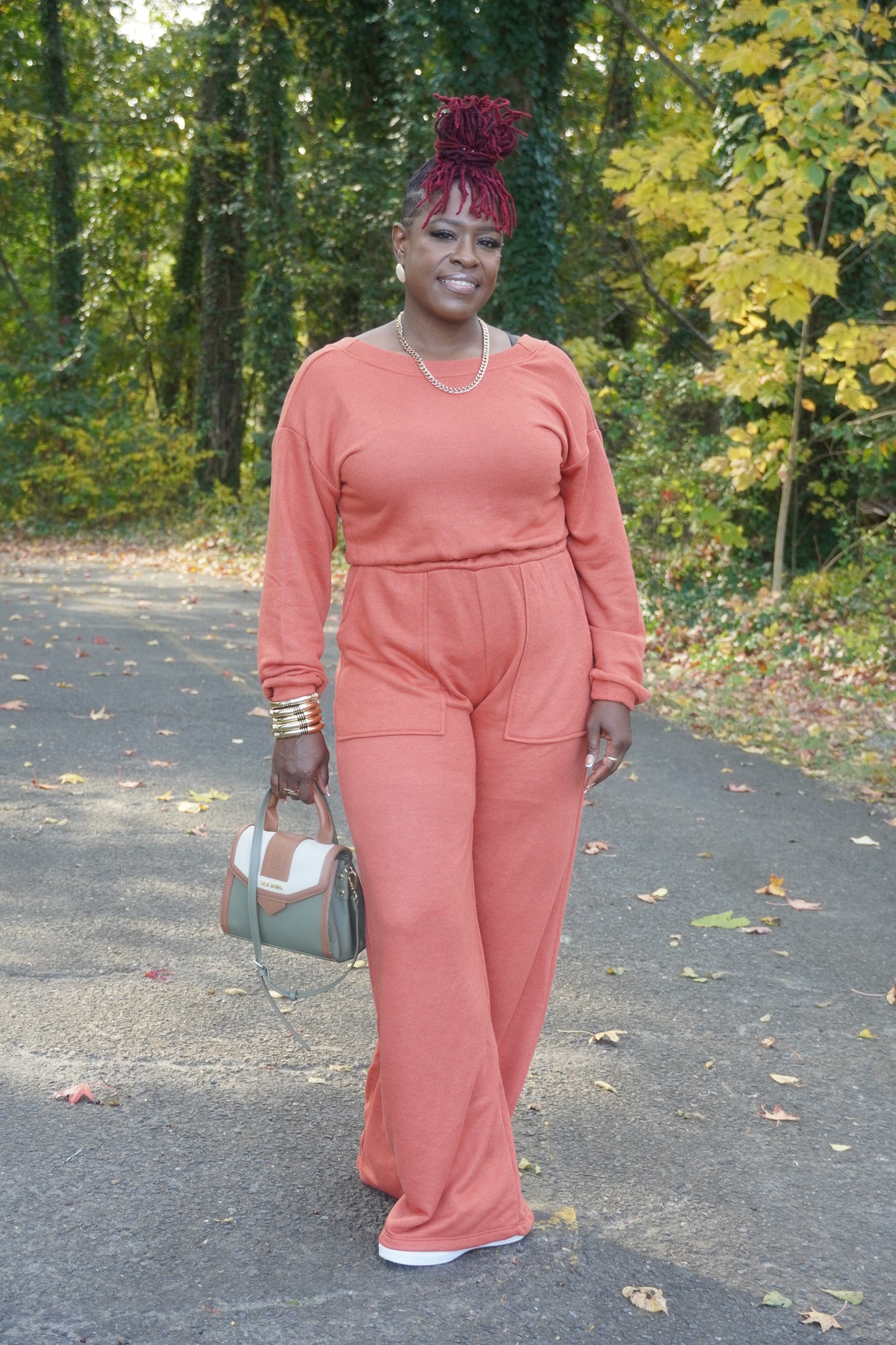 RUST LONG SLEEVE WIDE PANTS JUMPSUIT W/POCKETS AND OPEN BACK