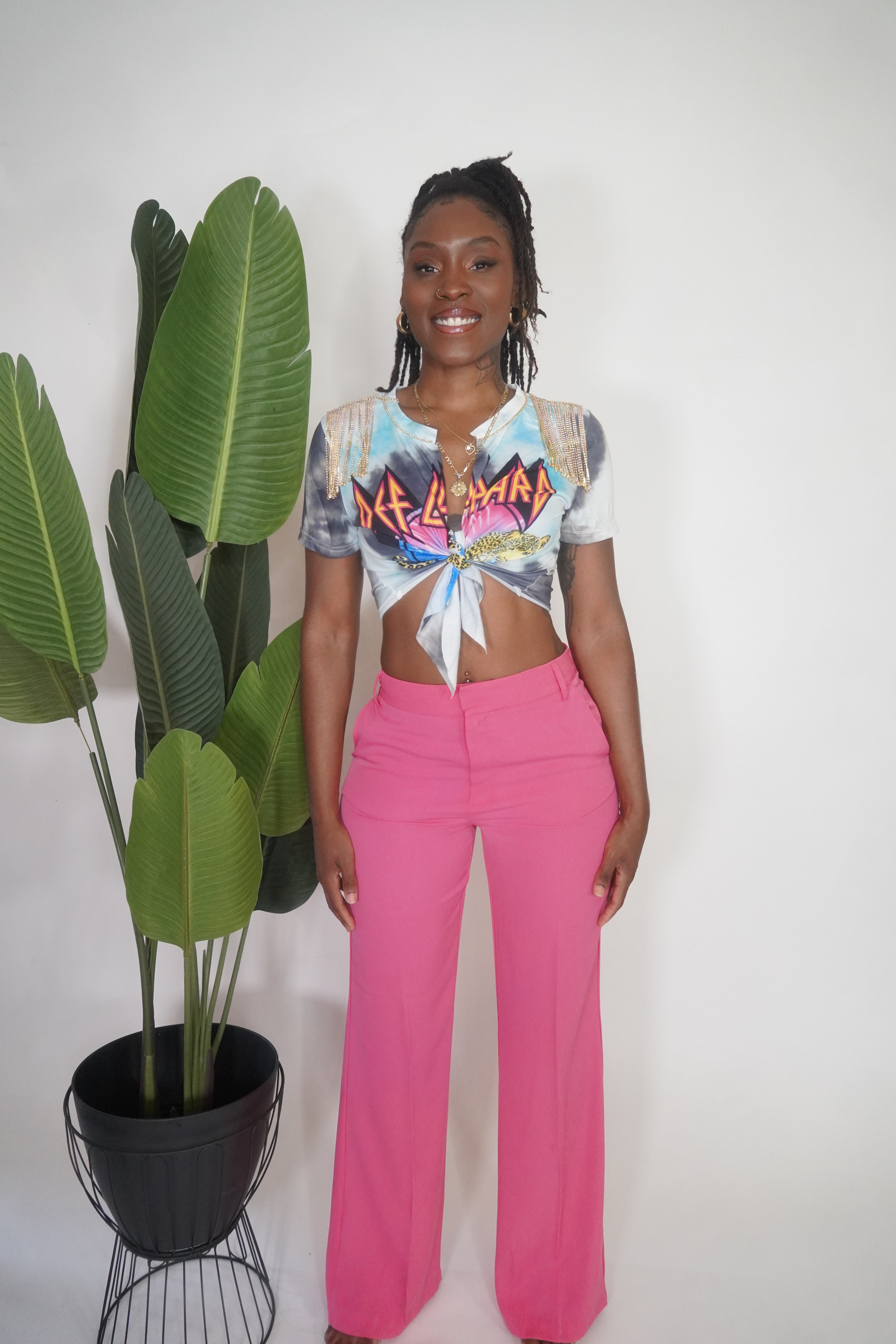 Pink high waisted slight flare trousers